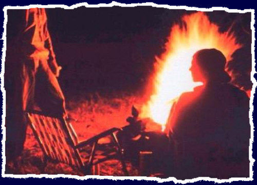 Friends before a campfire somewhere in AZ