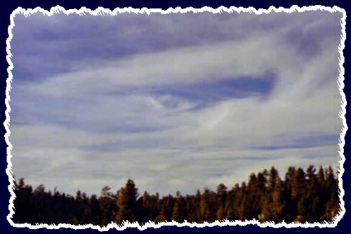 A weird picture over the Flagstaff sky of an eye overlooking our movements