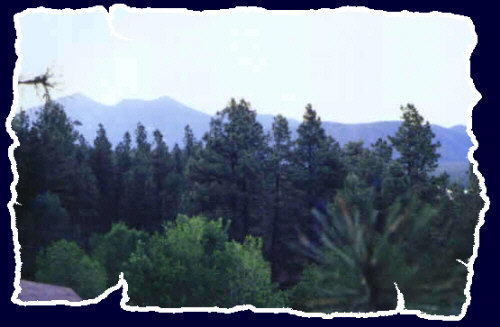 Another scene of the San Francisco peaks in Flagstaff Arizona just after sunset with the aperture wide open and a delayed exposure - Summer 2000