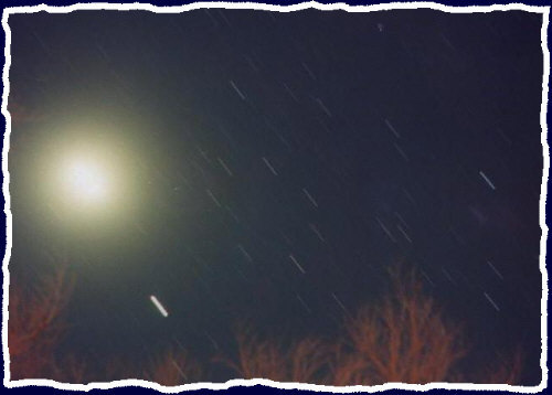 The full moon and stars moving in the background of the Cornville Arizona sky - a time lapse picture