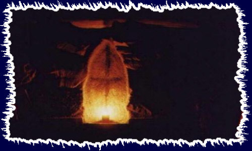 A killer shot of a friends fireplace with a fire goin'